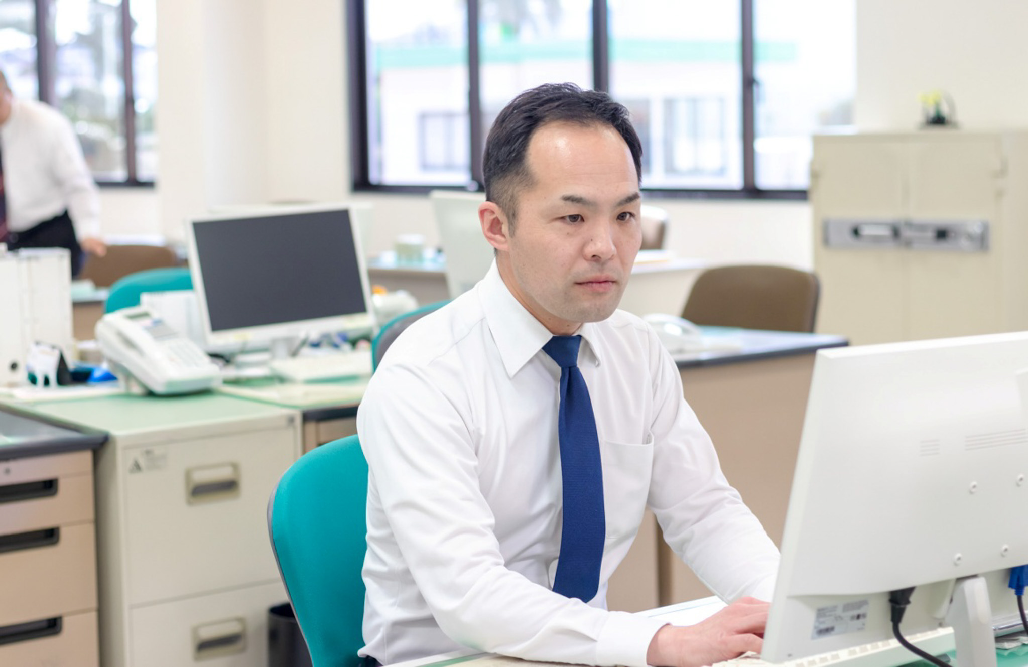 システム管理やベンダーとの調整などを担当します